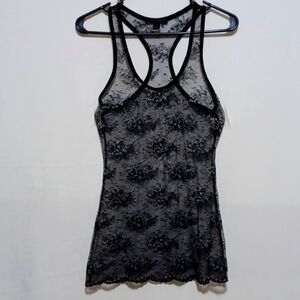 EXPRESS LADIES SHEER TOP SIZE SMALL IN A BEAUTIFUL BLACK AND SILVER